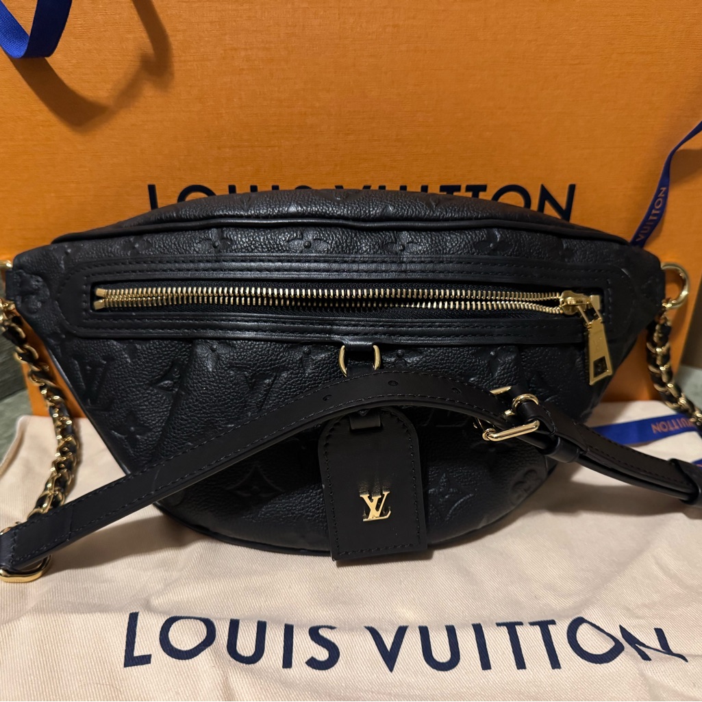 Luxury Black Crossbody Bag With Gold Accents